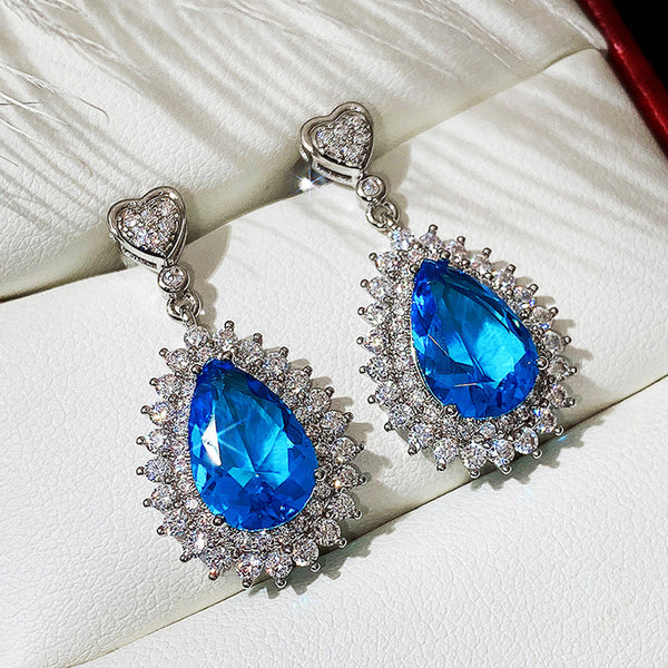 Silver Plated Anti Tarnish American Diamond Studded Blue Teardop Shape Ice Cut Drop Earrings