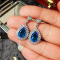 Silver Plated Anti Tarnish American Diamond Studded Blue Teardop Shape Ice Cut Drop Earrings