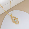 Gold Plated Anti Tarnish Stainless Steel Evil Eye Themed Buddha Hand Pendant